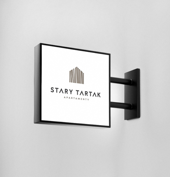 kaseton reklamowy z logo apartamentów Stary Tartak