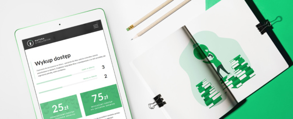 tablet z otwartą stroną internetową Matura z Palladium, obok notatnik