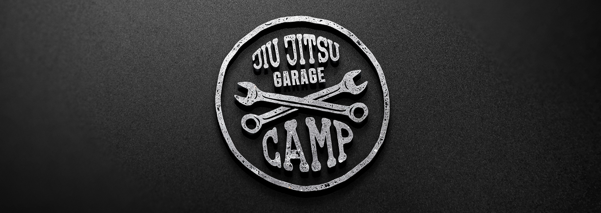 logo Jiu Jitsu Garage Camp tło