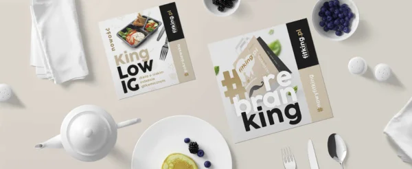prezentacja materiałów reklamowych na stole cateringu dietetycznego Fit King