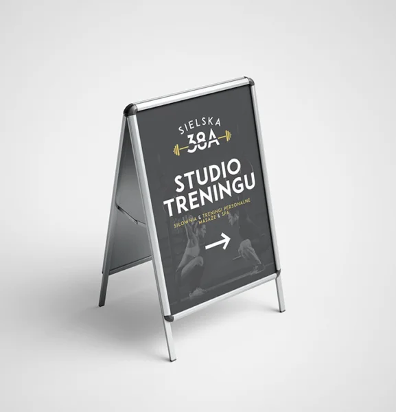 potykacz reklamowy z plakatem studia treningu Sielska 38A