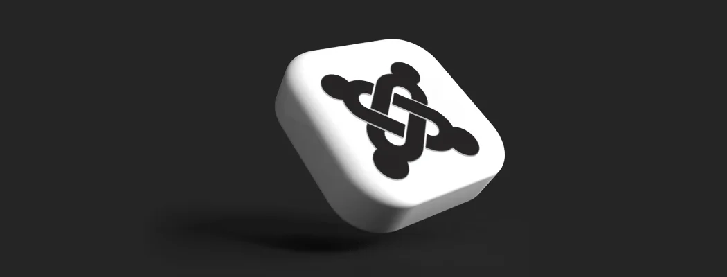 Logo Joomla jako nowoczesna kostka 3D na ciemnym tle do artykułu o systemach CMS