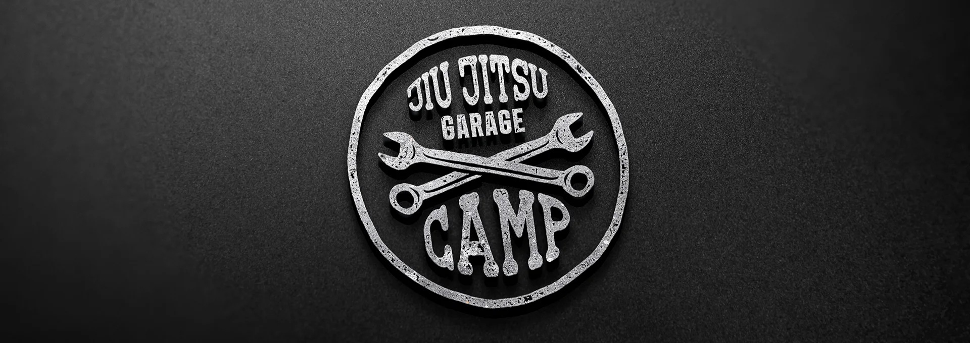 logo Jiu Jitsu Garage Camp tło