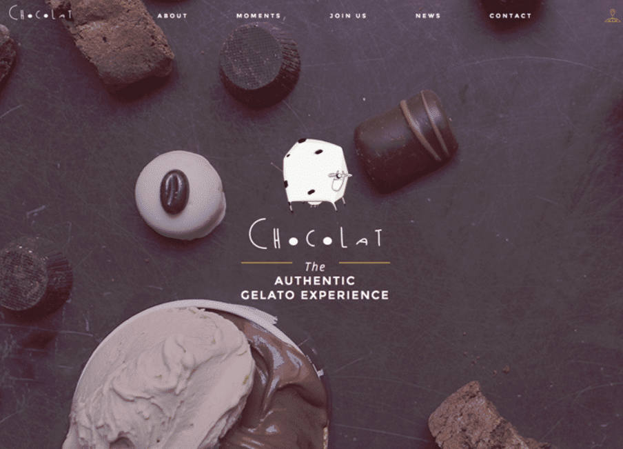 Strona marki Chocolat prezentująca tradycyjne włoskie lody rzemieślnicze gelato oraz czekoladki na ciemnym blacie
